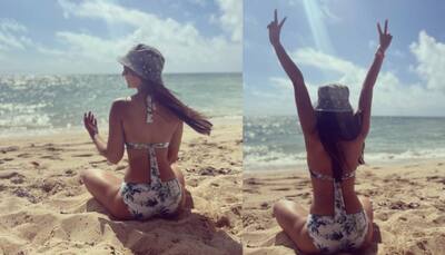 Kim Sharma stuns in a tropical theme bikini at the Bahamas, Leander Paes calls her ‘QUEEN’