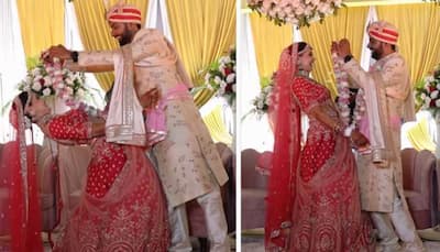 Matrix Wali Dulhan! THIS desi bride bends it like Beckham at jaimala ceremony - Watch