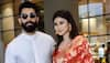 Newlyweds Mouni Roy, Suraj Nambiar arrive in Mumbai, actress glows in red saree, gold jhumkas: Watch