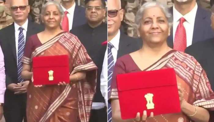 Budget 2022: FM Sitharaman arrives at Parliament in orange handloom saree ahead of budget presentation – In PICS!