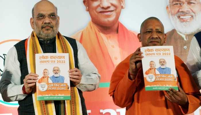 UP Assembly polls 2022: Amit Shah releases BJP&#039;s manifesto, promises 10-year punishment for those indulging in &#039;love jihad&#039;