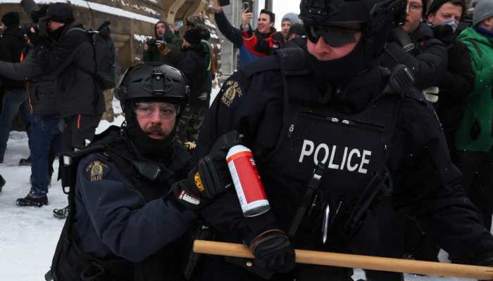 Truckers' protests: Canadian police use stun grenades, arrest over 170 to sweep protesters