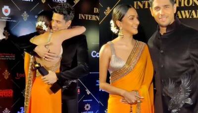 Kiara Advani hugs Sidharth Malhotra, blushes while posing with rumoured beau at event: WATCH