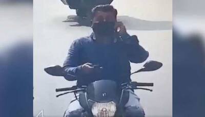 Motorcycle, two phones, handsfree riding: Why Vadodara police issued challan to THIS man 