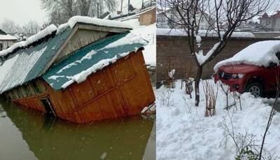 Heavy snowfall disrupts life in Kashmir, flights cancelled, National Highway closed