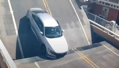 Watch: Viral video shows driver escaping Honda Accord stuck on drawbridge