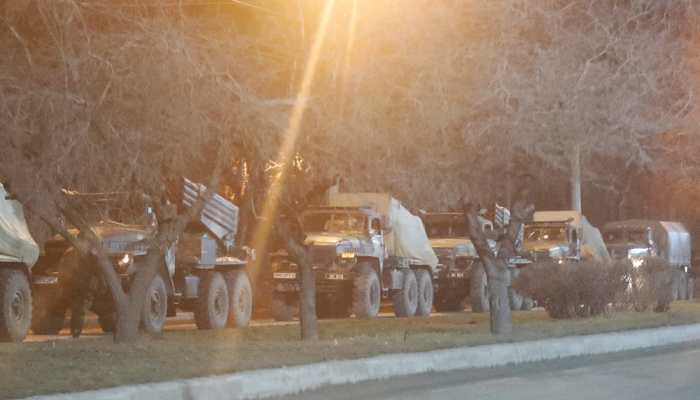 Military vehicles on a street on the outskirts of Donetsk