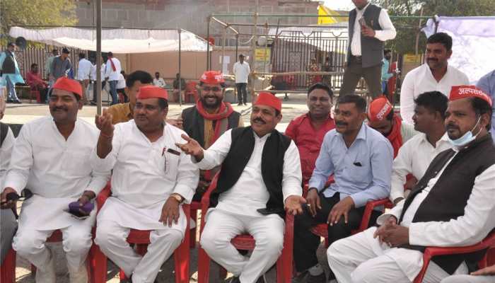 Samajwadi Party workers outside vote counting center in Lucknow ahead of election result day.