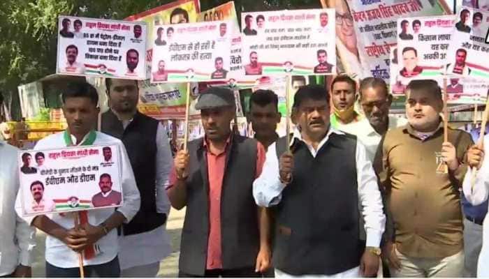 Election Result 2022: Congress workers protest against EVMs as party trails  in all 5 states | India News | Zee News