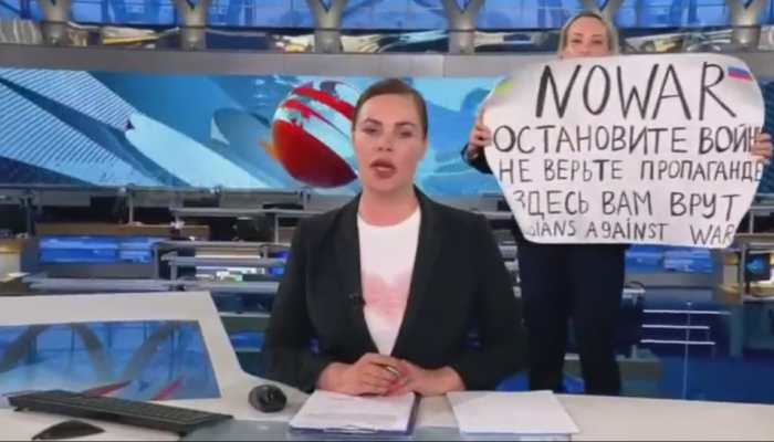 'Don't believe propaganda': 'Anti-war' journalist in studio disrupts live Russian state TV news - Watch