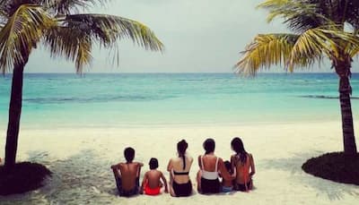 Kareena Kapoor chills with sister Karisma and kids at a beach in Maldives – See pic!