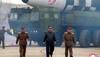 Kim Jong Un sports shiny leather jacket in Hollywood-style video for North Korea's missile launch - WATCH
