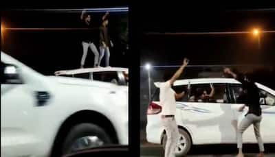 Watch: Ghaziabad youths dance on car roof, police nab them, send challan home