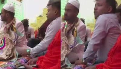 Desi Money Heist? Man steals cash from groom's garland - Watch viral video