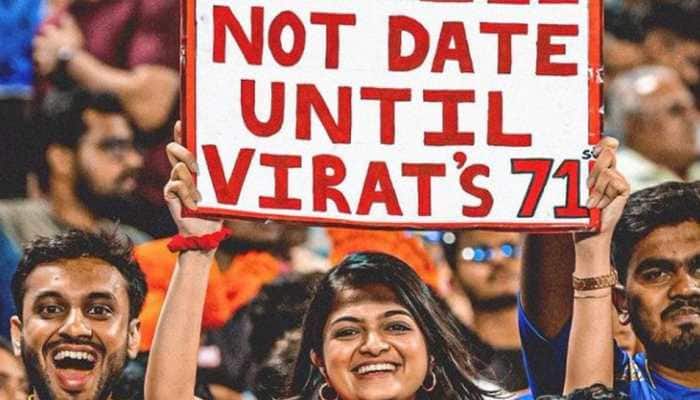 I will not date until Virat&#039;s 71st: Fangirl&#039;s poster for Kohli during RCB vs MI IPL 2022 clash goes VIRAL