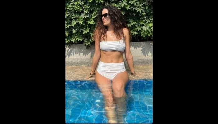 IPL 2022: GT skipper Hardik Pandya’s wife Natasa Stankovic chills by the pool in white bikini, check PIC