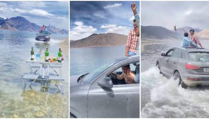 SHAME! Tourists drive Audi Q3 through Ladakh&#039;s Pangong Lake, netizens furious - WATCH
