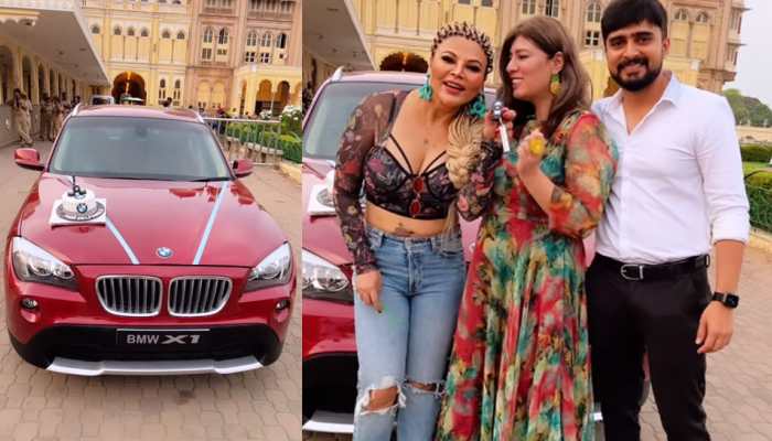 Rakhi Sawant welcomes home red hot BMW X1 worth Rs 43 lakh, watch her cut a theme cake on swanky new car - Watch