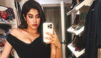 Janhvi Kapoor wears little black dress, gives biscuits to poor as she gets papped late night - Watch