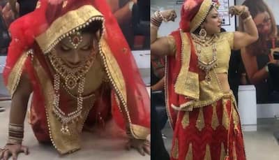 Watch: Bride does push-ups in heavy wedding lehenga, video goes viral
