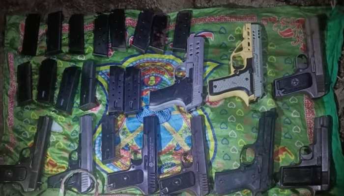 '10 pistols with magazines, 5 grenades': Huge cache of arms and ammunition recovered in J&amp;K's Kupwara