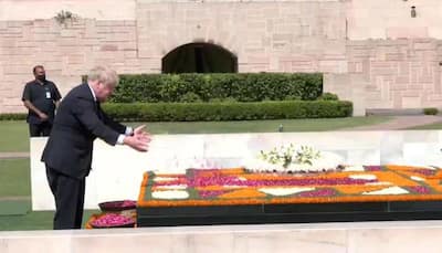 UK PM Boris Johnson pays homage to Mahatma Gandhi at Raj Ghat after grand welcome in Delhi