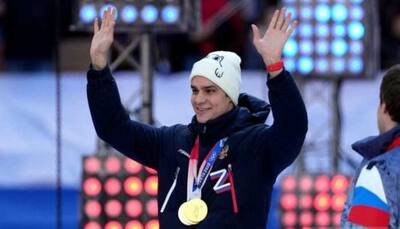 FINA bans Russian swimmer Evgeny Rylov for appearing in support rally for Vladimir Putin