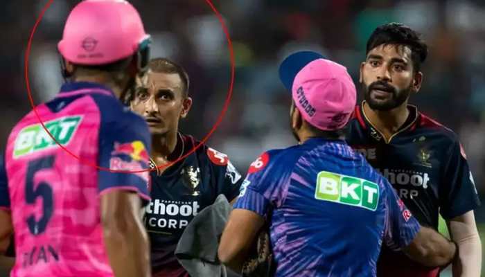 IPL 2022: Harshal Patel, Riyan Parag involved in verbal fight after RR batter smashes RCB pacer for 18 runs in last over - WATCH