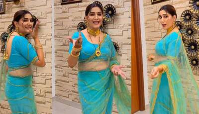 Sapna Choudhary's desi dance on Ankhiyon Se Goli Maare in a blue see-through saree hits internet - Watch