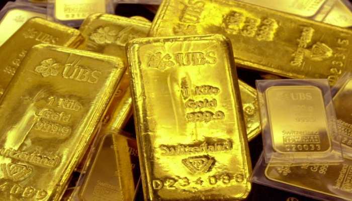 Gold price falls as dollar goes up to 20-year high: Should you buy?