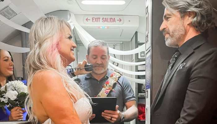 Love&#039;s in the air! In unique wedding, couple gets married on flight, pictures surface - Watch