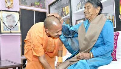 UP CM Yogi Adityanath seeks blessings of his mother in native village in Uttarakhand— See picture