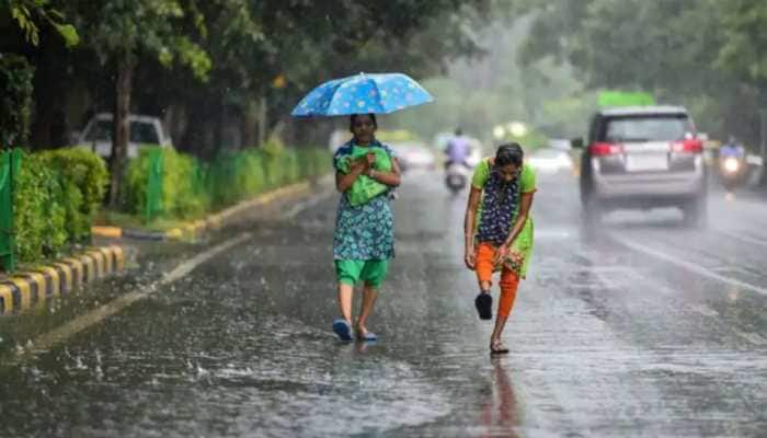 Delhi weather update: Rain, hailstorm bring some respite to people amid severe heatwave