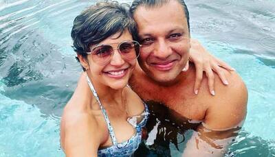 Bikini-clad Mandira Bedi gets BRUTALLY trolled for sharing pool pics with a male friend! 