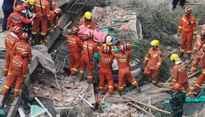 53 dead in China building collapse; search for trapped ends as rescuers find 10 survivors 