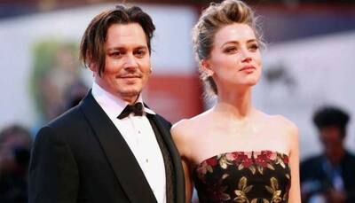 Amber Heard accuses 'jealous' Johnny Depp 'kicked her in the back' suspecting affair with co-star James Franco