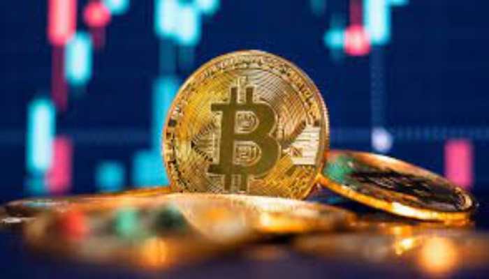 Bitcoin falls to 22-month low as stock markets tumble