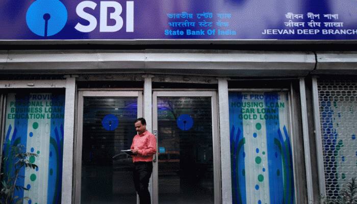 SBI Q4 profit jumps 41% to Rs 9,114 crore on fall in bad loans