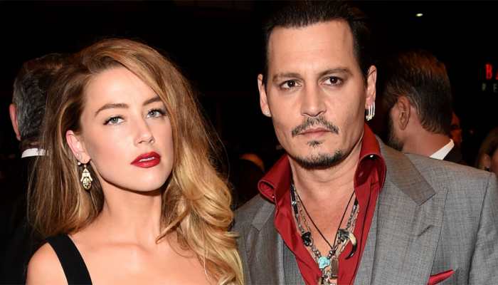 Amber Heard alleges estranged husband Johnny Depp's pic with two black eyes is 'photoshopped'!