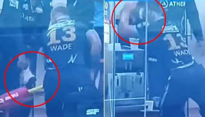 IPL 2022: Gujarat Titans&#039; Matthew Wade loses cool vs RCB, smashes bat in dressing room due to &#039;unfair&#039; DRS call - WATCH