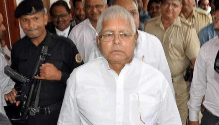 CBI officials leave RJD chief Lalu Prasad Yadav&#039;s residence after conducting raids