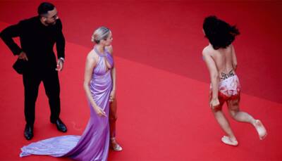 Woman protesting Ukraine sexual violence removed from Cannes red carpet