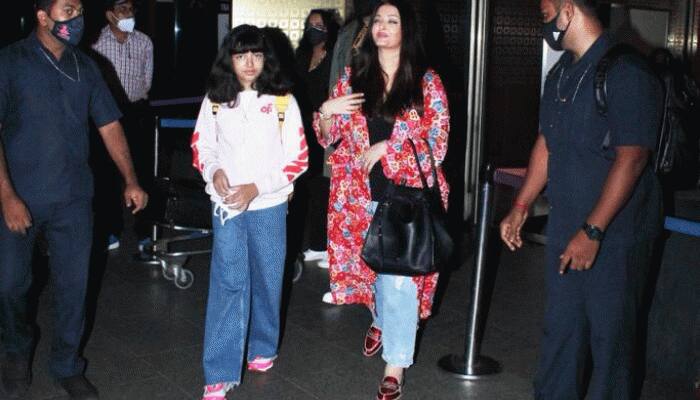 Cannes 2022: Aishwarya Rai Bachchan returns from French Riviera with Abhishek, spotted holding daughter Aaradhya&#039;s hand at airport