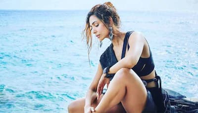 Malaika Arora teases hot bikini pics, stunner calls herself a 'beach baby'!