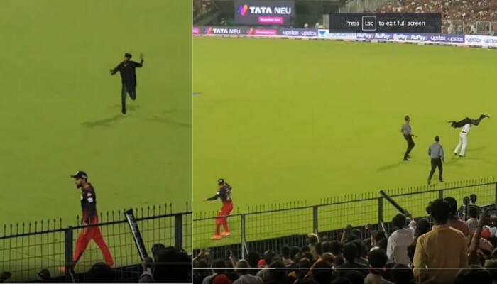 WATCH: Kohli fan gets stopped by Kolkata police personnel &#039;Bahubali Style&#039; during IPL 2022 Eliminator