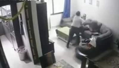 School principal uses CCTV footage to record domestic abuse by wife - Watch SHOCKING video!