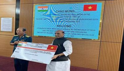 Rajnath Singh hands over cheque of USD 1 million to Vietnam for the Air Force Officers Training School in Nha Trang