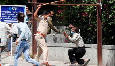 Andhra traffic cop suspended after video of him kicking a drunk man goes viral
