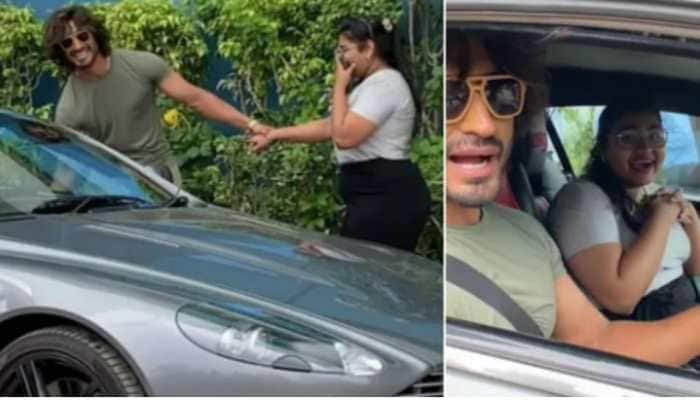Vidyut Jammwal makes a fan&#039;s day by taking her on a fun drive in his Aston Martin - WATCH!