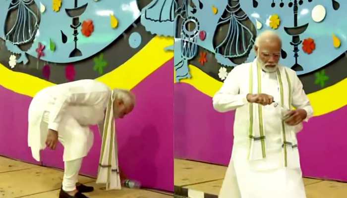 PM Narendra Modi picks up litter with bare hands during inspection of Pragati Maidan tunnel in Delhi - WATCH